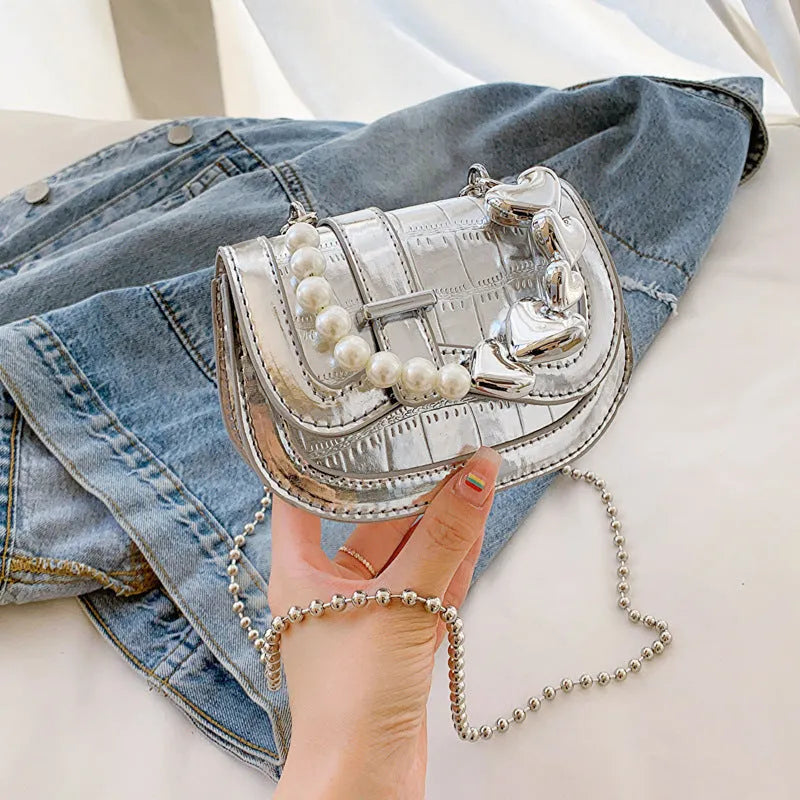 Women's laser pearl tote saddle crossbody bag in silver with street trend design