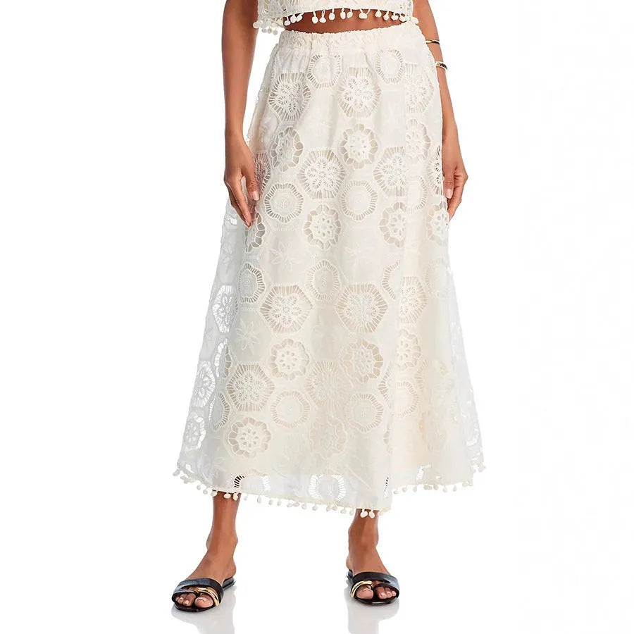 White women's sleeveless top and long skirt suit set with embroidery detail in retro art style