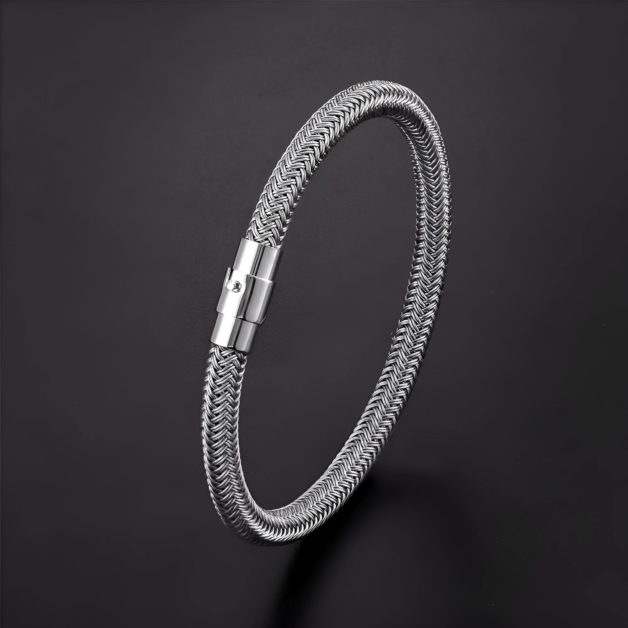 Men's titanium steel geometric wire bracelet with a magnetic clasp, shown in a silver finish.