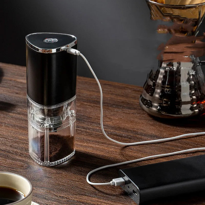 Electric coffee grinder with ceramic burr, USB rechargeable, portable, in frosted white on dark background
