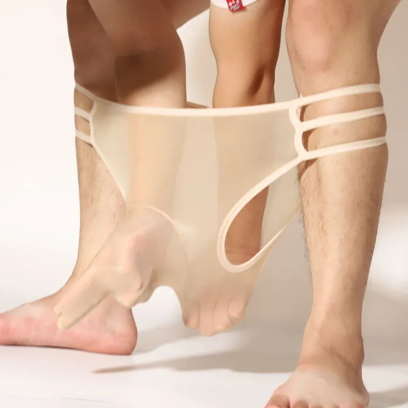 Men's transparent elephant nose shorts in stretch nylon fabric on a mid-waist model.