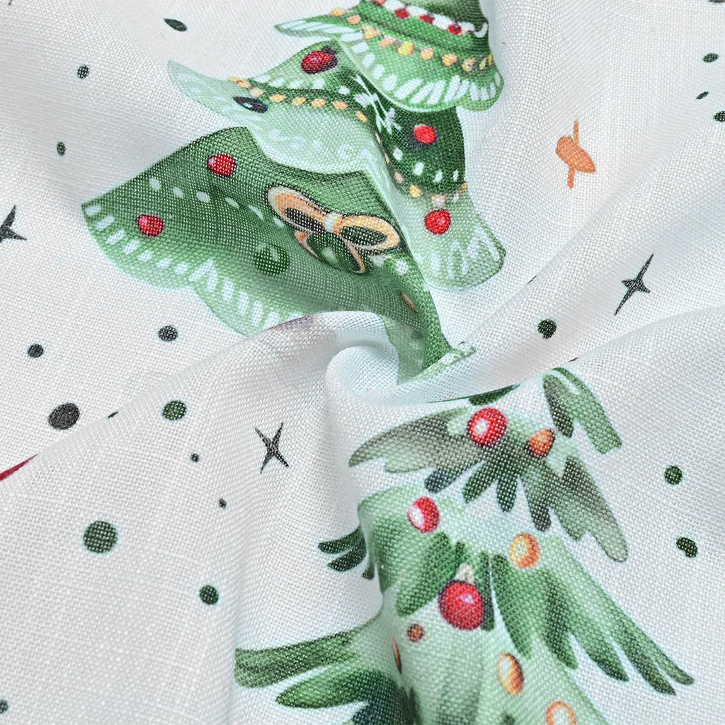 White polyester curtain with punched Christmas Forest tree pattern, showcasing its modern simplicity style and sunshade fabric.