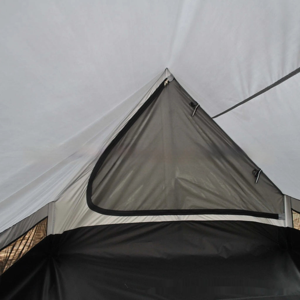Brown or white A-line hiking tent pitched using hiking canes, showing spacious interior for 2-3 people.