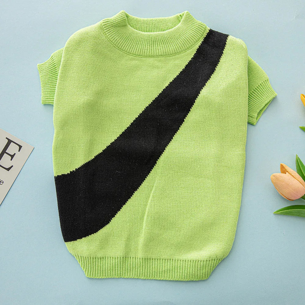 A colourful wool knit dog jumper for small breeds like a Corgi, shown in light green and other colour options.