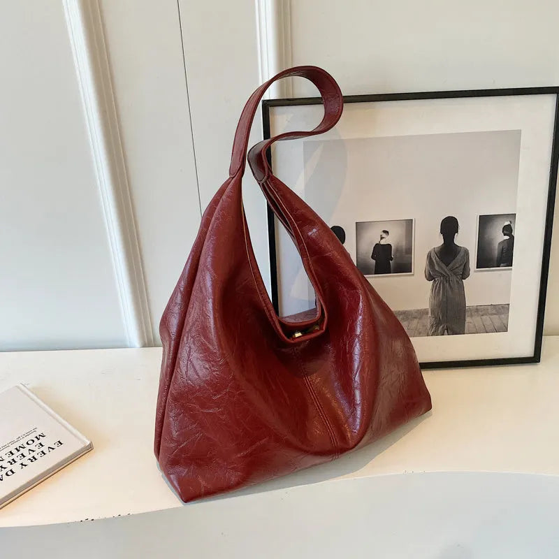 Casual soft leather shoulder bag with large capacity and sandwich pocket in street trend style