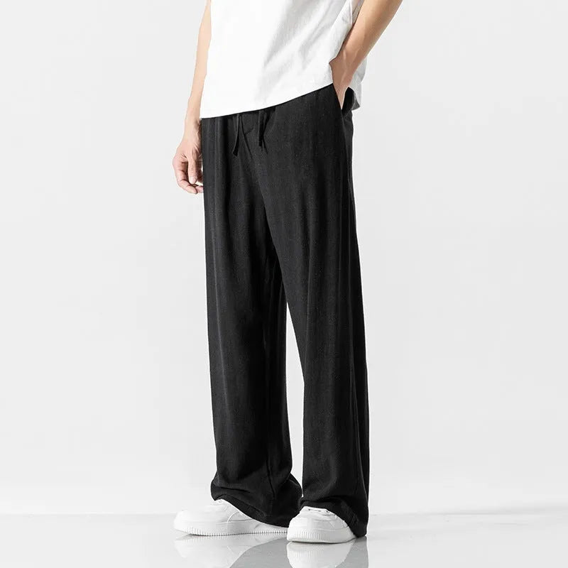 Men's bamboo fibre linen trousers in loose straight-leg cut with cropped length and drawstring waist