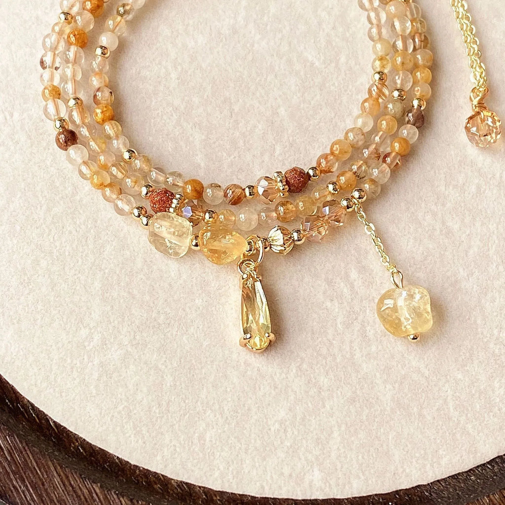 Natural citrine multi-layer hair crystal bracelet in gold electroplated finish with Saturn design element