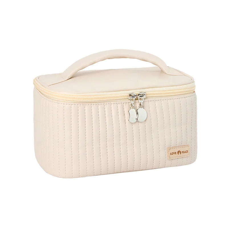 Open-top round cake-shaped makeup bag in a solid PU leather colour from the pink, coffee, beige, blue, green, purple range.