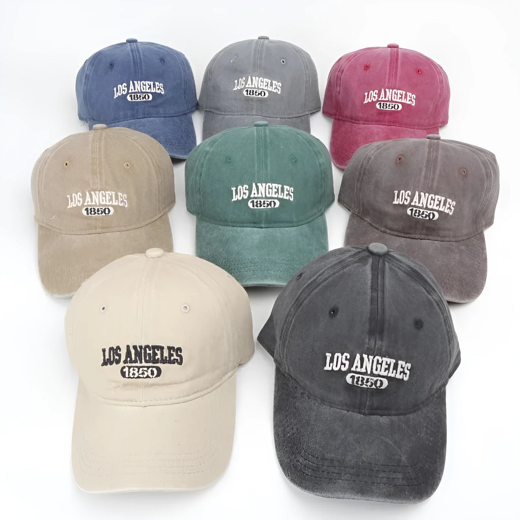 Retro-style personalised baseball cap with distressed letter embroidery on an adjustable strap, shown in beige colour.
