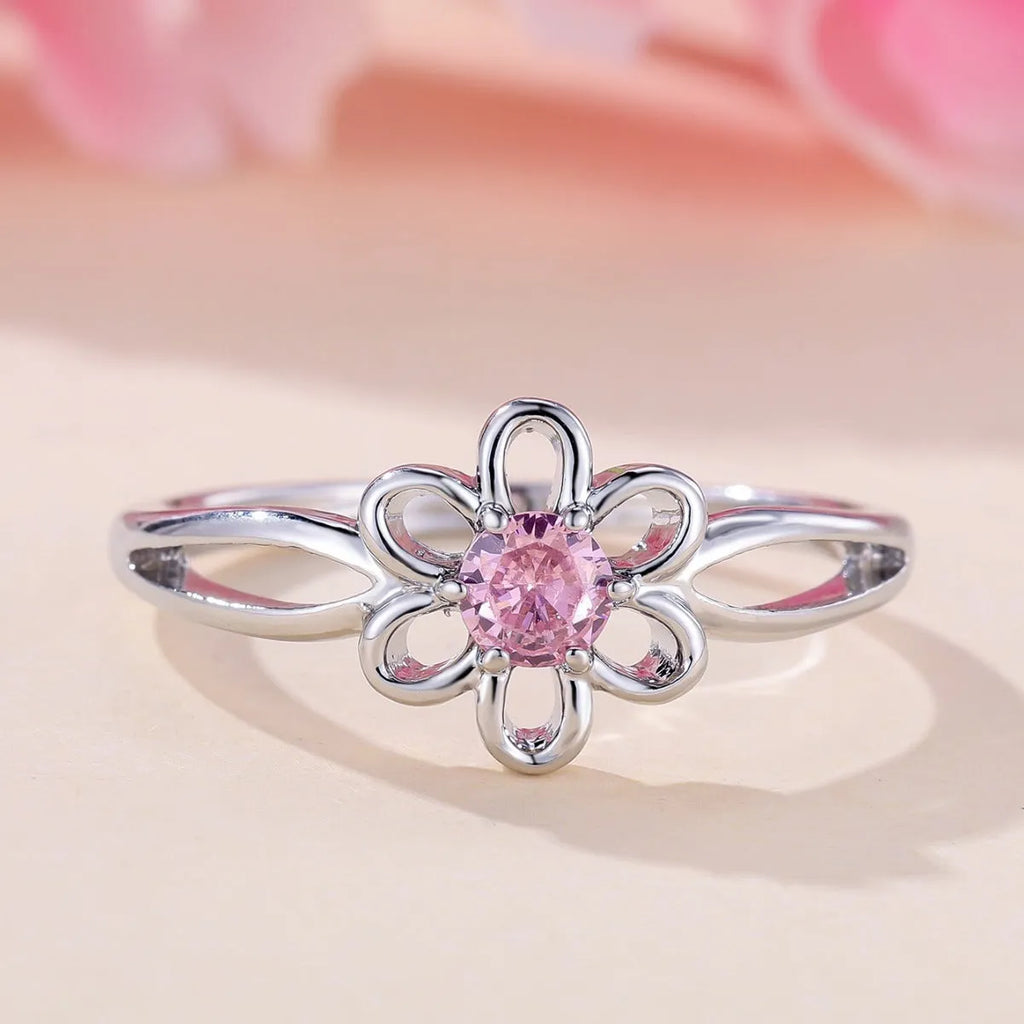 Women's hollow floral fashion ring in electroplated copper with a choice of metallic finishes.