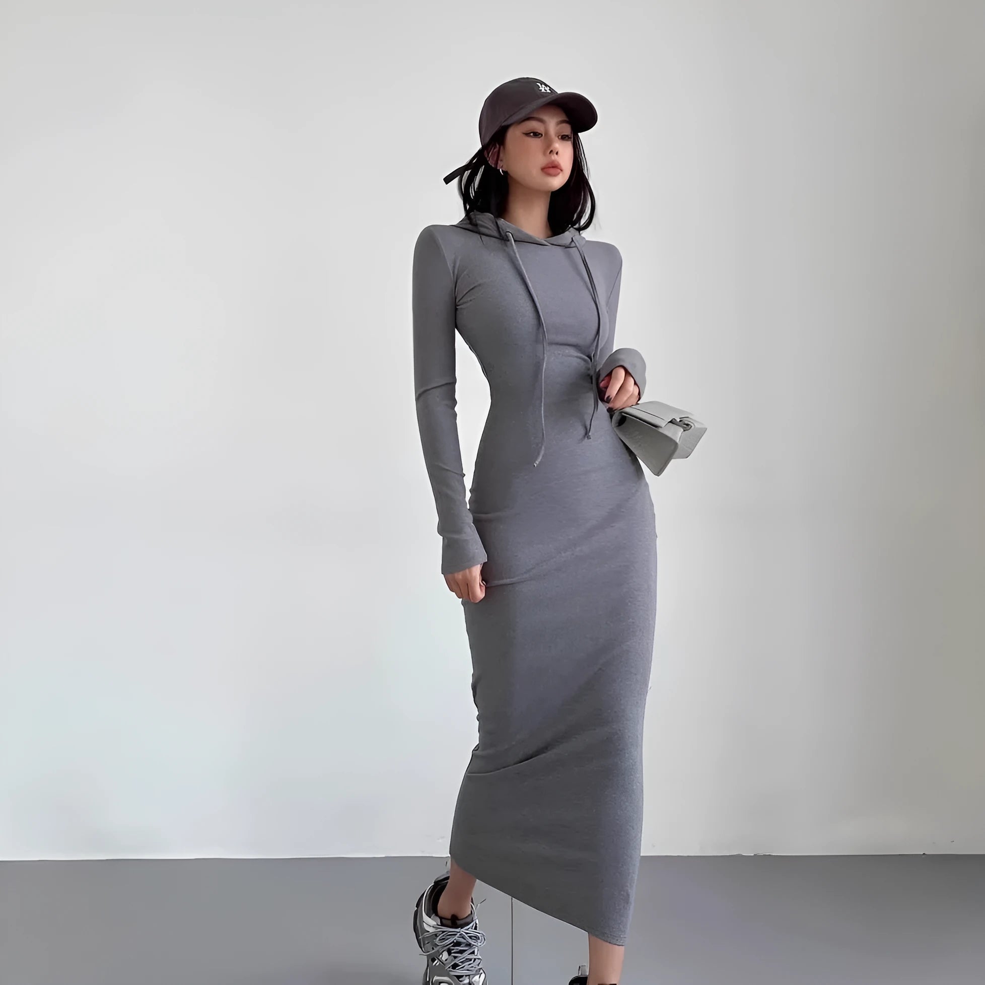 Women's hooded long sleeve sheath dress in polyester fabric with over-the-knee length