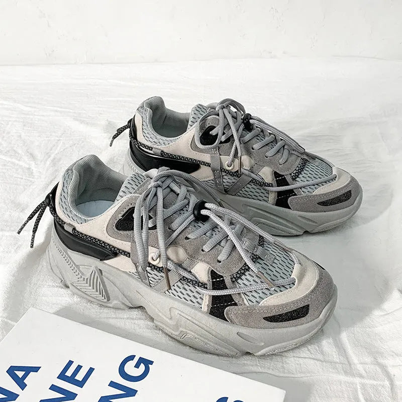 Men's white Korean style platform sports shoes with lace-up front on a plain background.