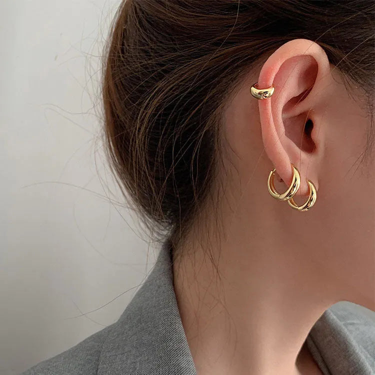Women's gold and silver water drop earrings in geometric minimalist design with three size options