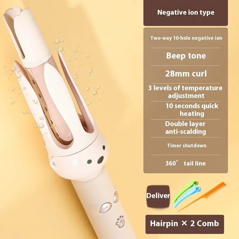 Beige anion automatic hair curler with wired power cord and included hair stick on a white background.
