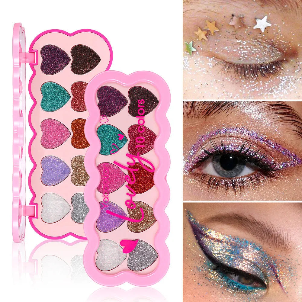 Heart-shaped ten-colour eye shadow palette with pearlescent sequin finishes in white, beige, pink, purple, brown, blue, black, royal blue, maroon, and coral.