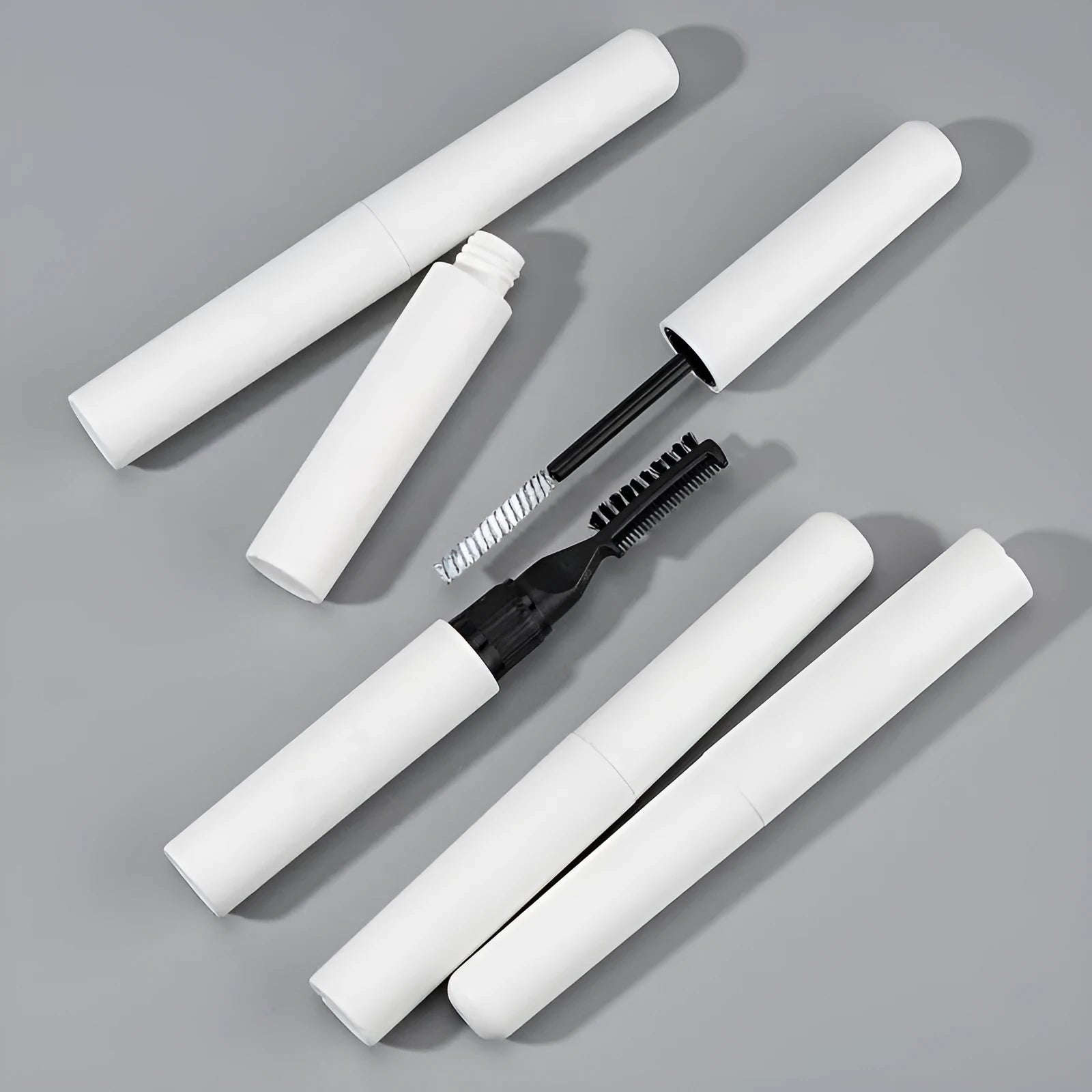 Eyebrow gel with brush applicator for natural wild eyebrow shaping in pink or white