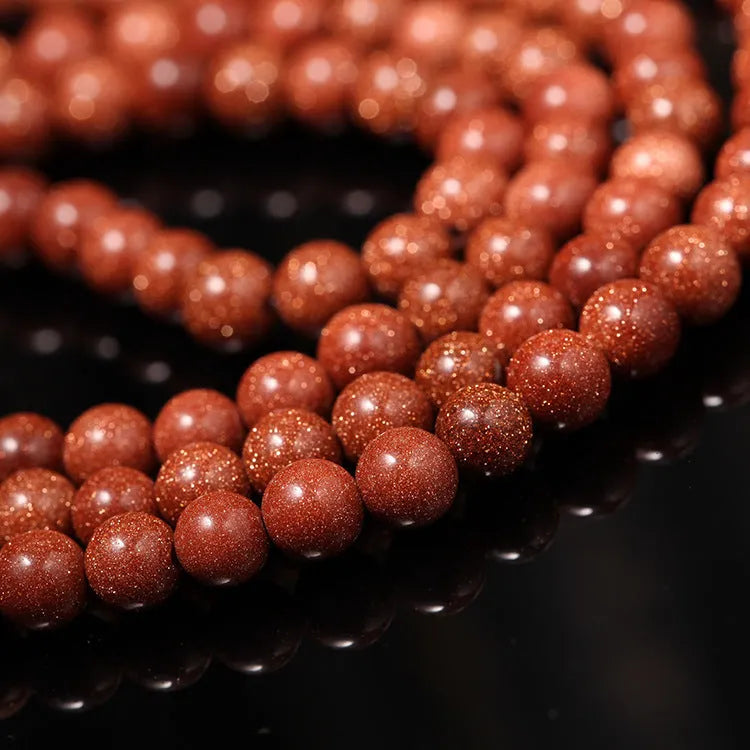 Golden star stone bracelet with 108 nugget sand beads showing fu character and multi-circle design