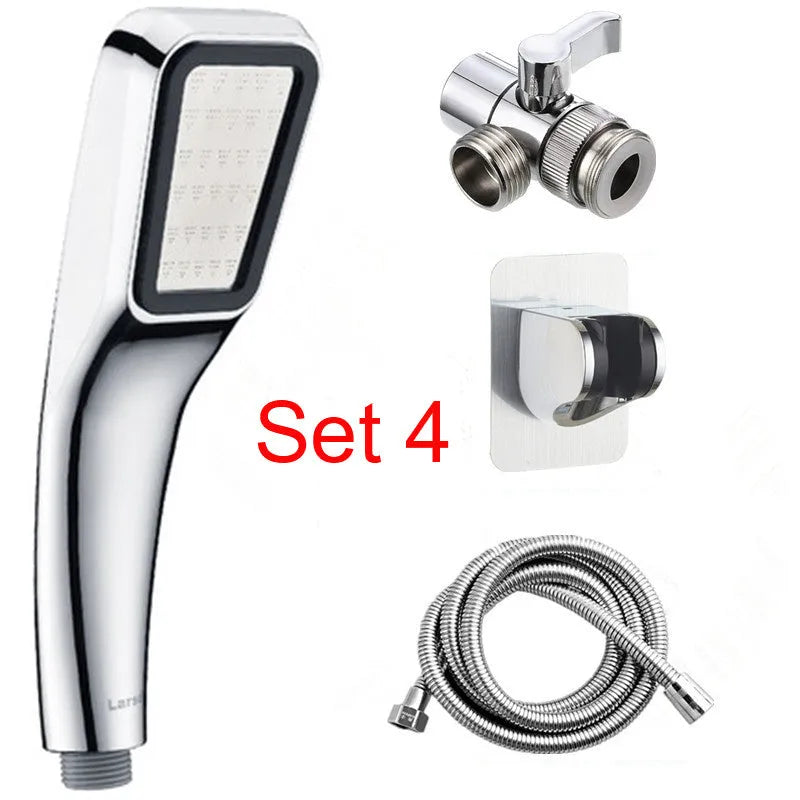 Orange hand-held rain shower set with wall bracket and connection hose