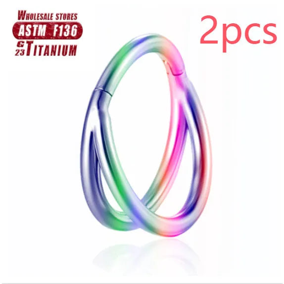 Titanium alloy fork nose ring set in various colours and lengths on 1.2mm gauge.