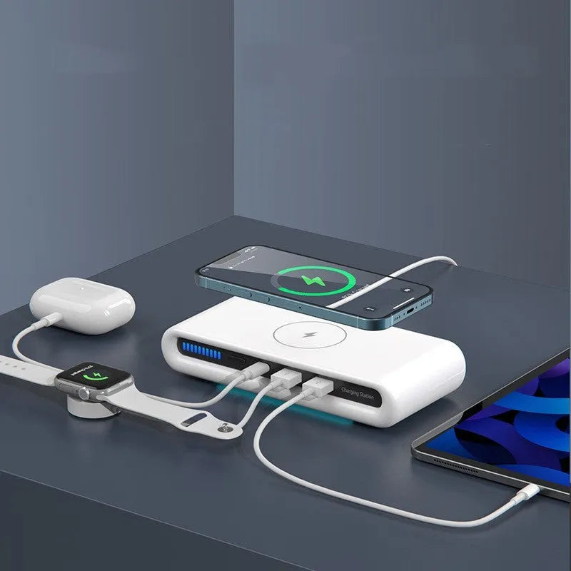 White desktop wireless charging pad with 15W fast charging and a multi-colour LED atmosphere lamp on top.