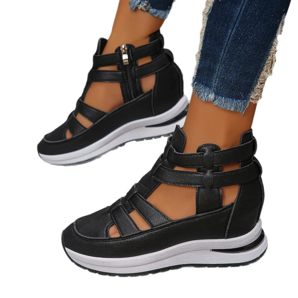 Women's black close-toed hollow-out platform sandals with Velcro fastening showing round toe design