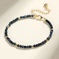 Close-up of a women's blue tourmaline beaded bracelet with 3mm gemstone beads and spacer details.