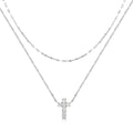 Double layer geometric twin diamond cross pendant on a sterling silver clavicle chain.