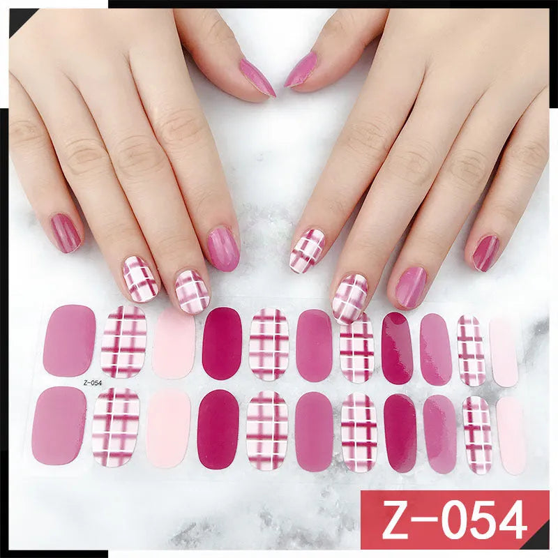 Korean Exquisite Nail Stickers pack showing colourful cartoon, floral, and embellished designs with included nail file.