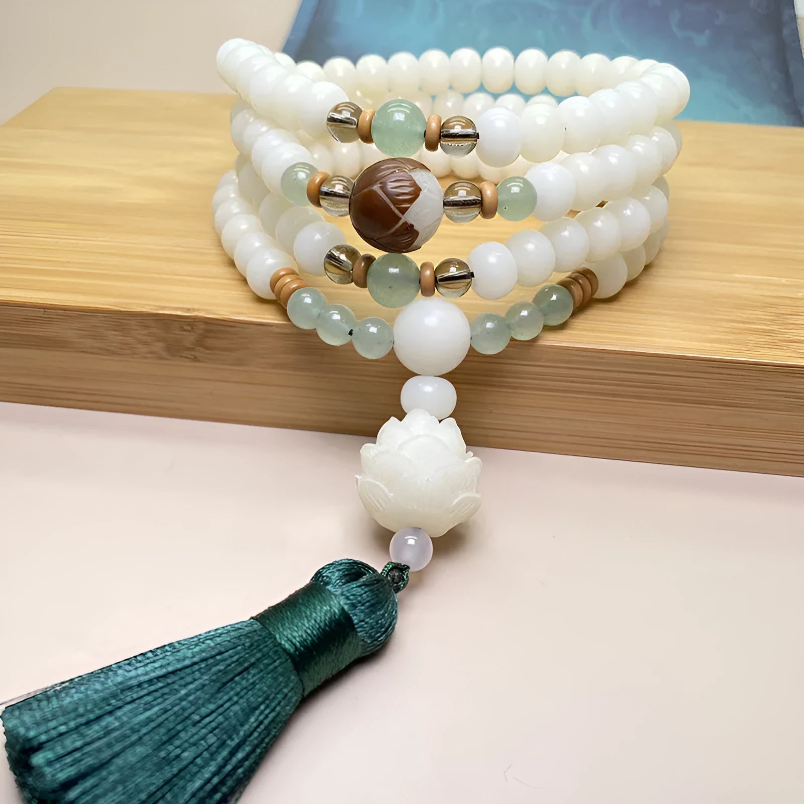 White Jade Bodhi 108-bead bracelet showing bead detail, available in three styles and sizes.