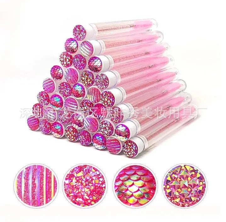 Disposable eyelash brushes in blue, green, pink and purple colours with transparent protective storage tubes