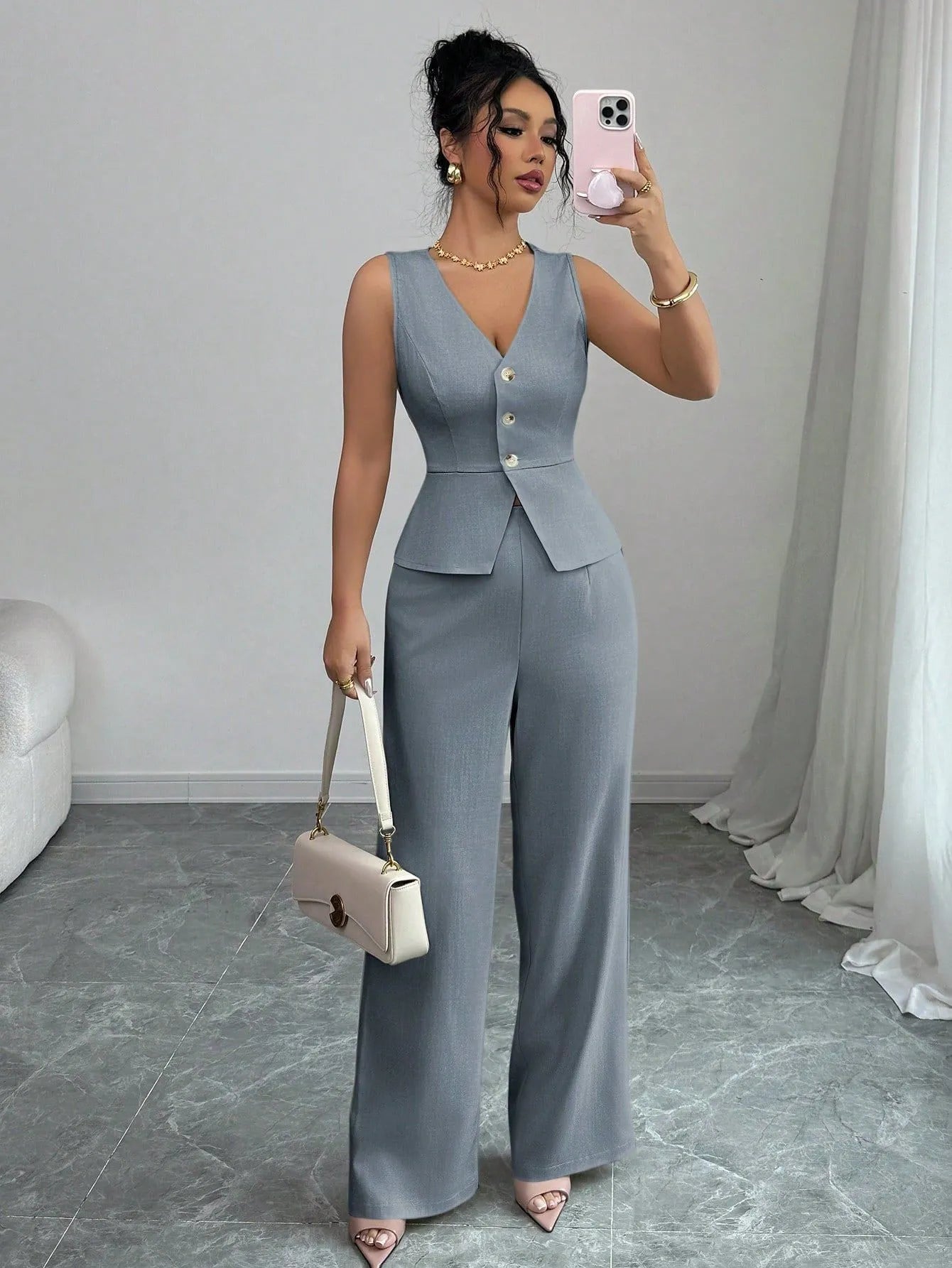 Women's black sleeveless vest and high-waist trousers two-piece casual set