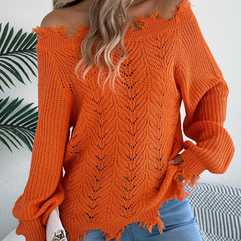 White hollow-out cut off shoulder pullover sweater with long sleeves on hanger