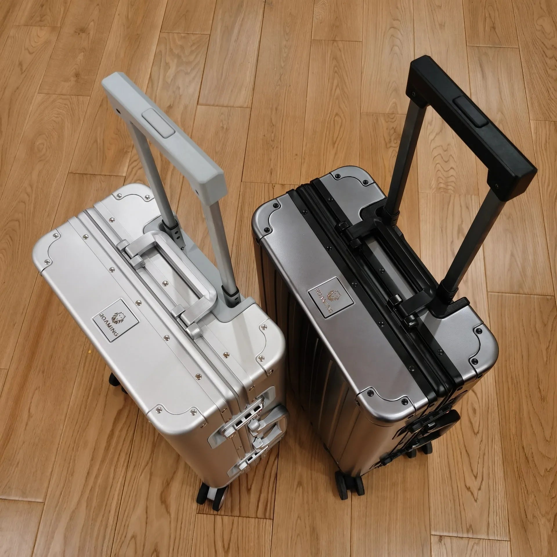 Aluminium magnesium alloy travel suitcase with striped pattern in silver colour, 24-inch size, metal hard shell construction