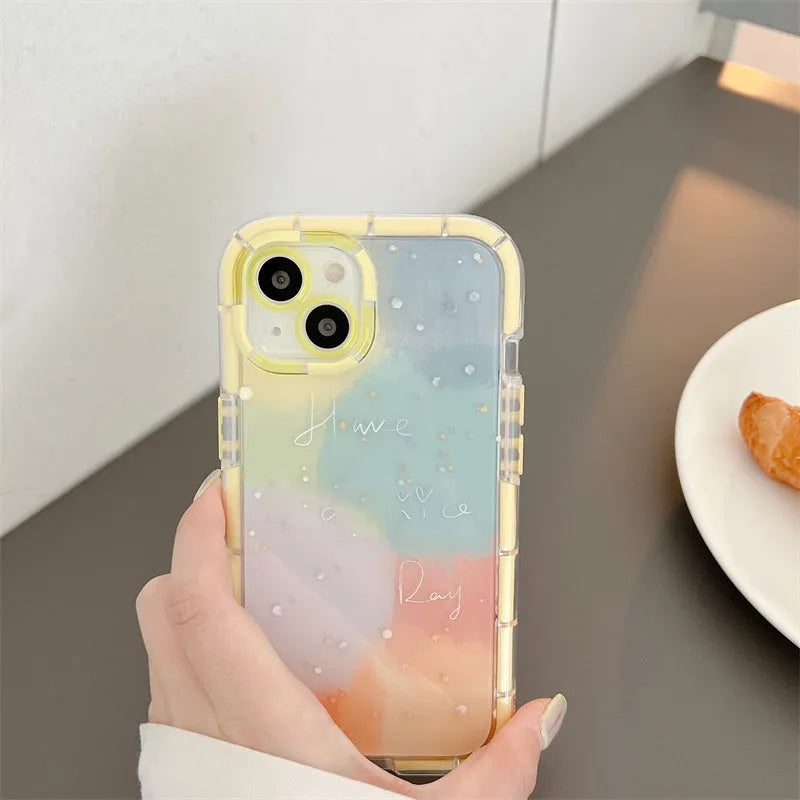 Minimalist iPhone 14 silicone case with a yellow edge on a dark background.