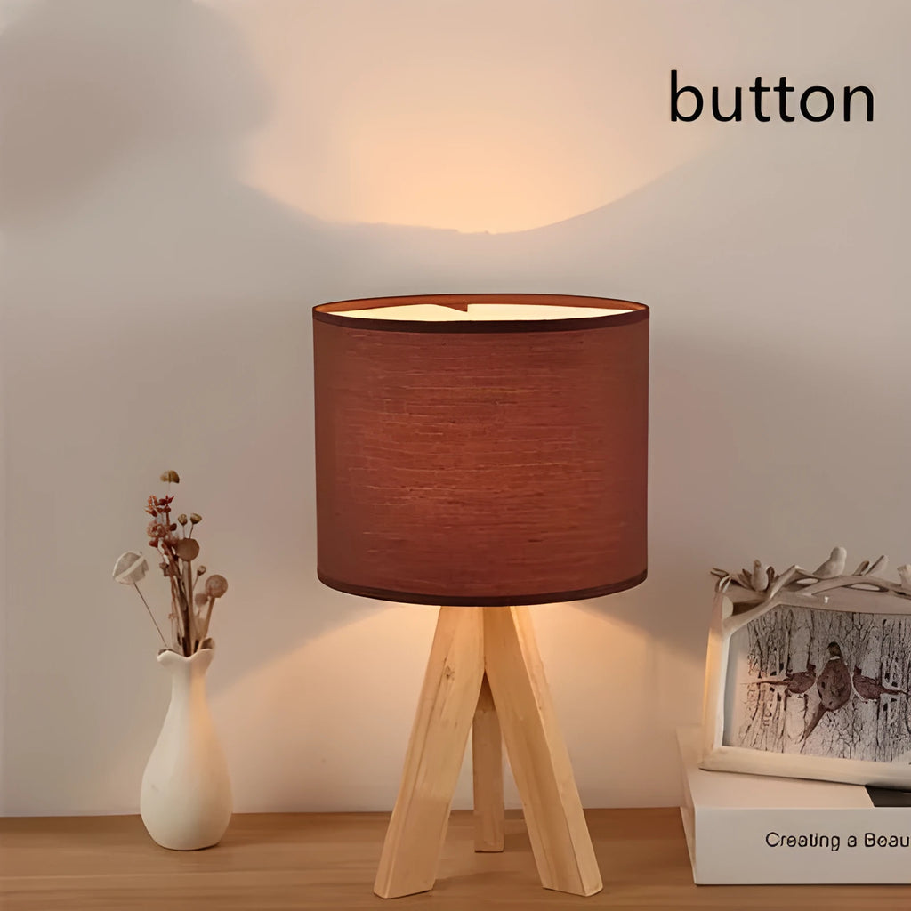 Japanese style solid wood table lamp with fabric lampshade in linen trumpet colour on bedside table