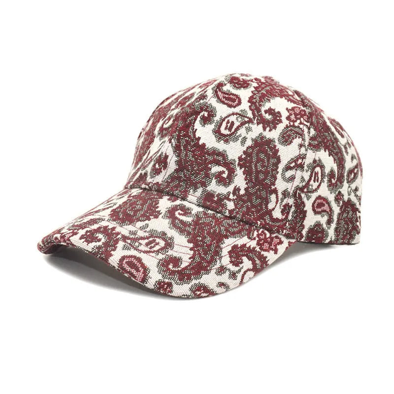 Polyester baseball cap with paisley pattern print in black colour showing dome crown design