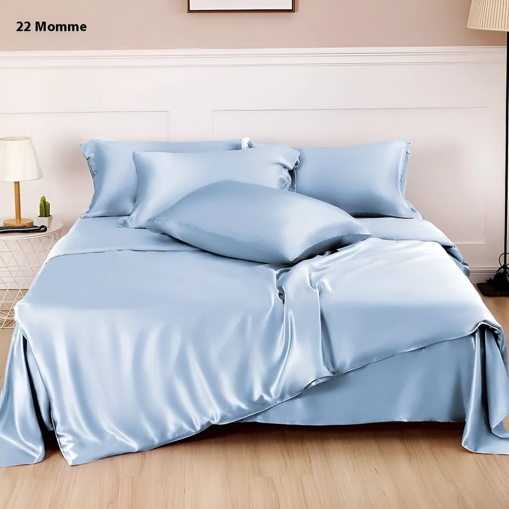 Reversible solid colour silk duvet cover shown in lotus pink, double-sided design.
