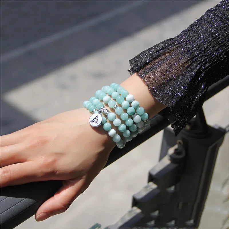 Women's bracelet with natural stone lotus pendant in geometric design showing eight colour variations