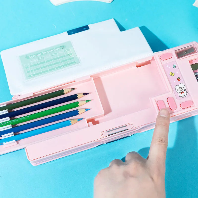 Multifunctional plastic pencil box with calculator in pink colour, double-sided opening