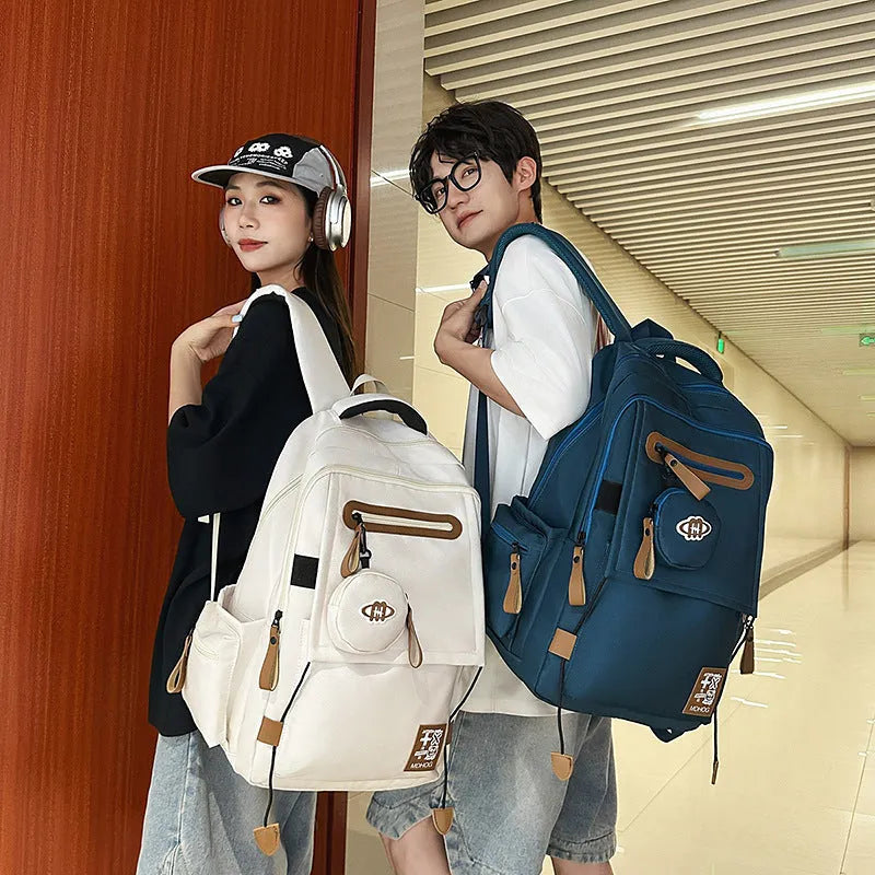 Japanese large capacity leisure travel backpack in khaki with contrast stitching and nylon waterproof finish