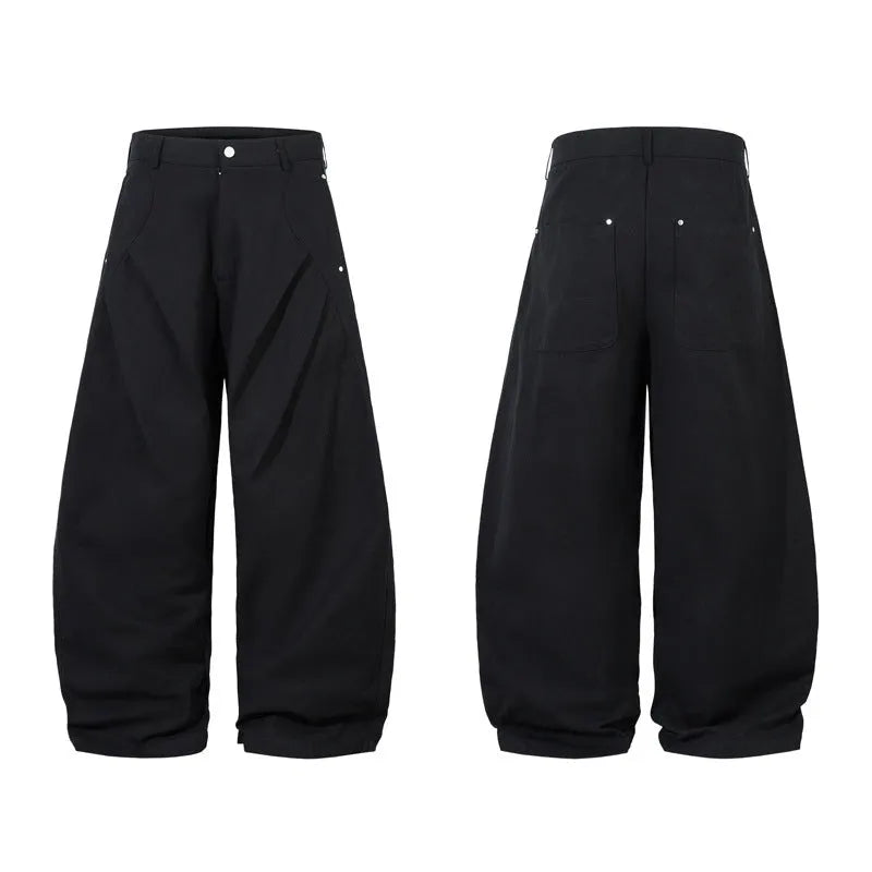 Black men's loose-fitting cotton pleated trousers with a wide-leg casual style.
