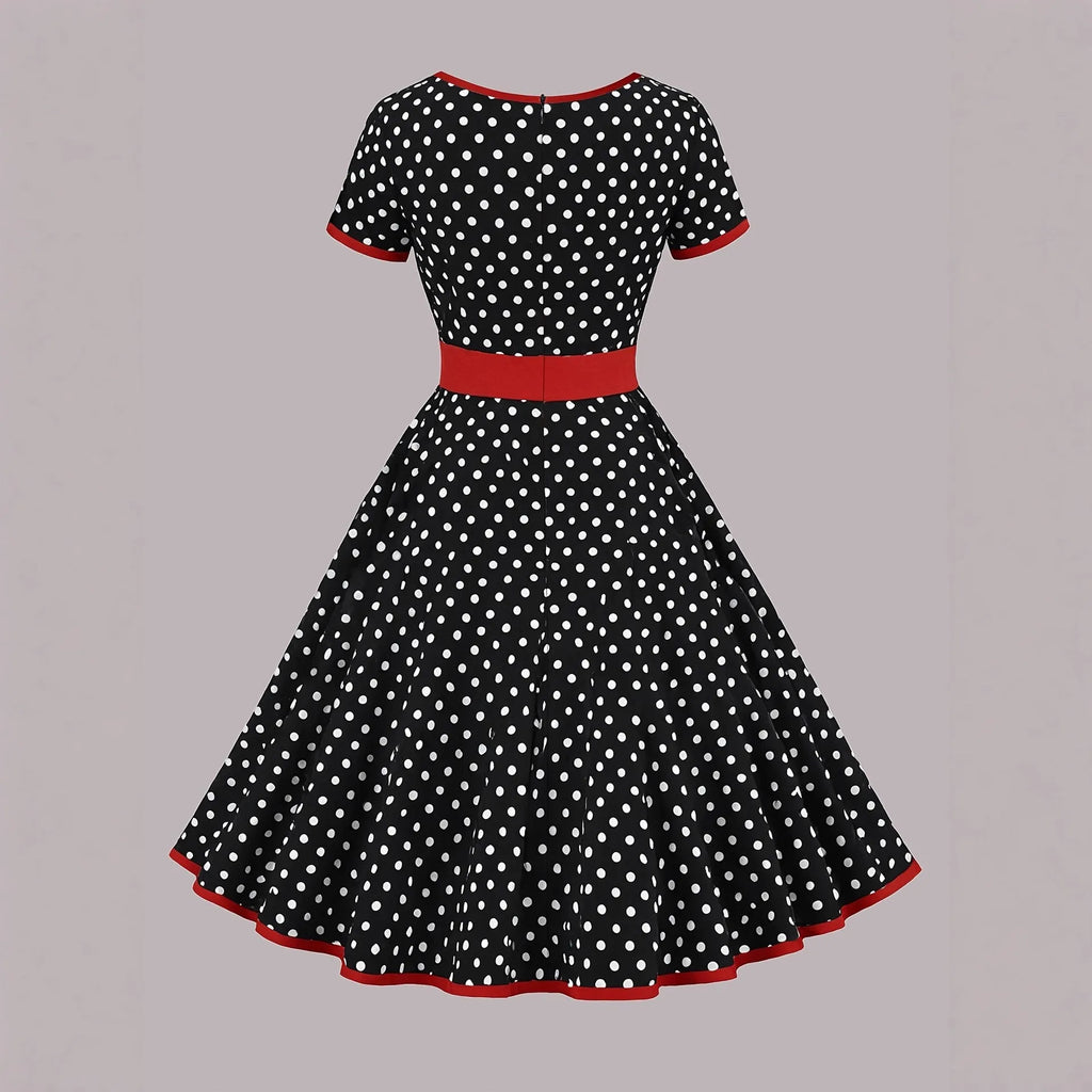 Multicolour polka dot women's dress with a square collar, short sleeves, and a pleated midi skirt.