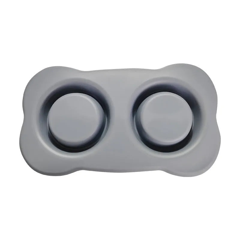 Large silicone dog bowl with stainless steel insert in double bowl configuration for pet feeding