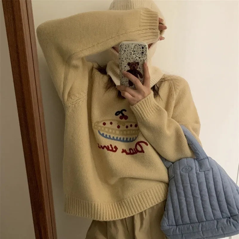 Women's round neck embroidered sweater in loose fit, available in seven colours including beige, gray, red, green, black, and rose red.