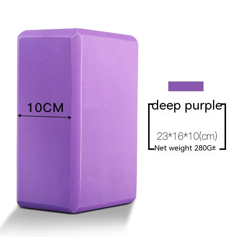 High-density EVA foam yoga block in various colours and prints on a workout mat.