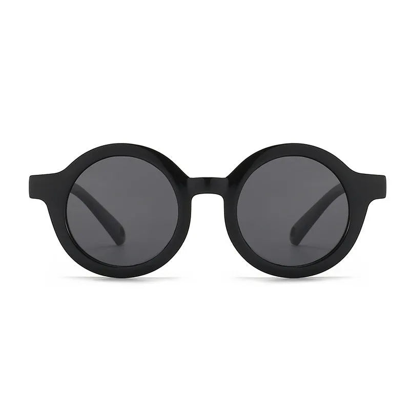 Children's round sunglasses for 0-3 year olds with UV400 protection, shown in a selection of colours.