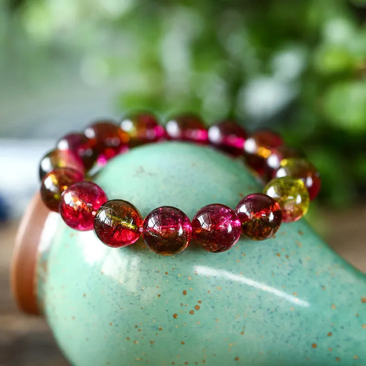 Handmade watermelon crystal bracelet in pastoral style shown in available sizes.