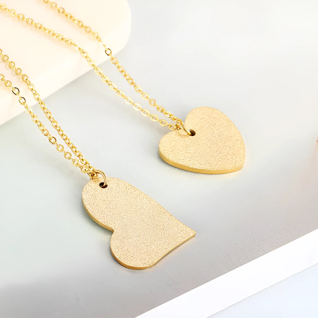 Geometric heart-shaped titanium steel pendant necklace on a model, colour KN25736-Z.