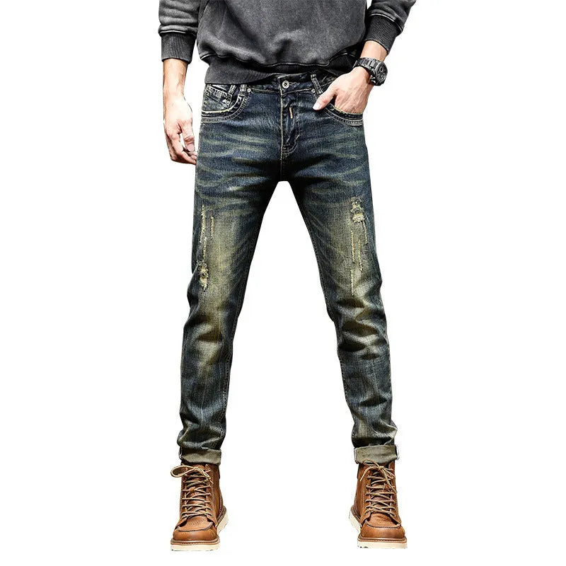 Men's skinny-fit jeans in a retro blue colour with a zip fly, shown laid flat.