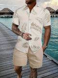 Man wearing a blue Hawaiian print short sleeve shirt and matching shorts from the casual suit set.